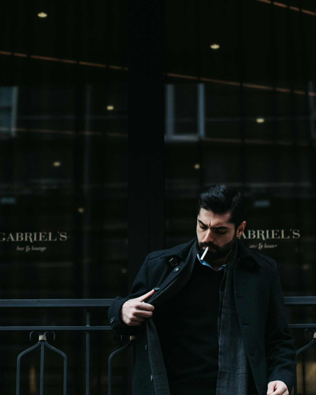 man wearing black jacket